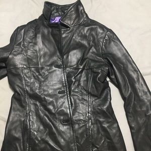Black leather Andrew Marc jacket, purple lining
